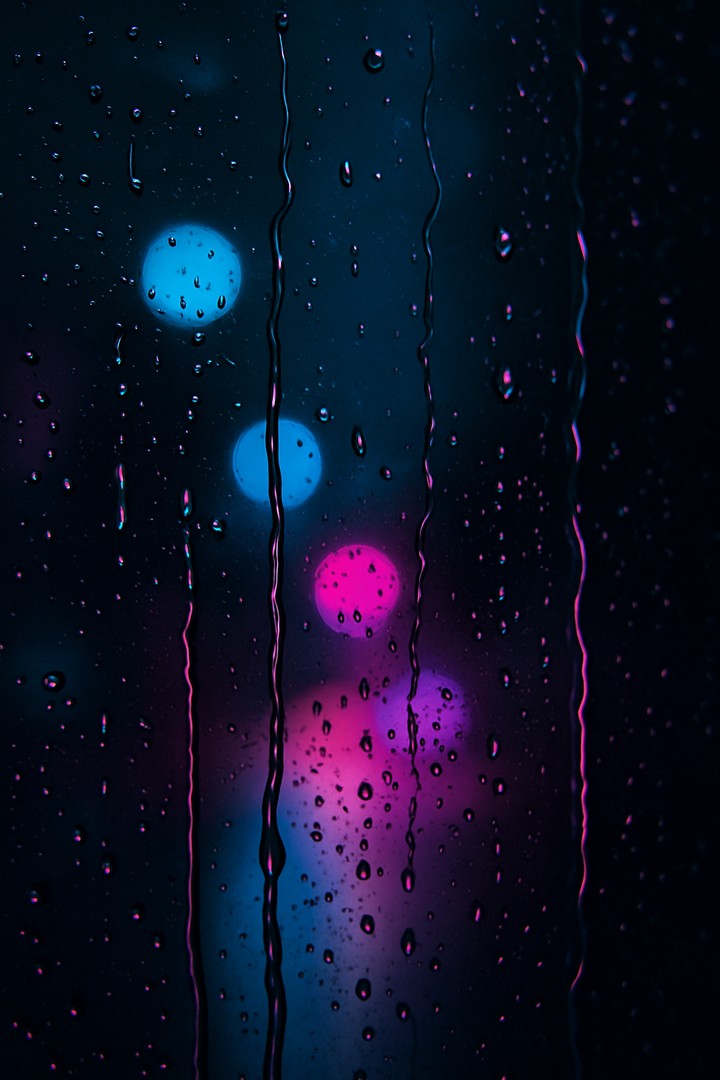 Raindrops on Glass – Aesthetic Rainy Day View walpaper