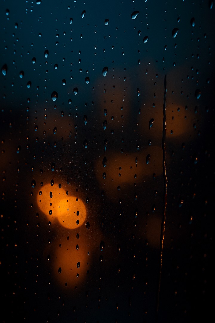 Raindrops on Glass – Golden Hour Glow
