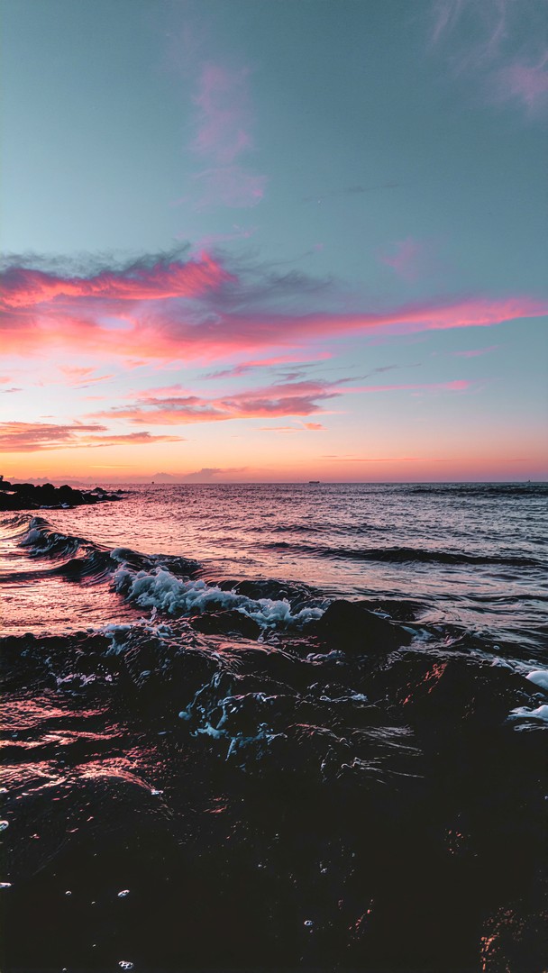 Pink Sunset Sky Wallpaper - Vibrant Magenta Clouds & Dark Ocean 4K