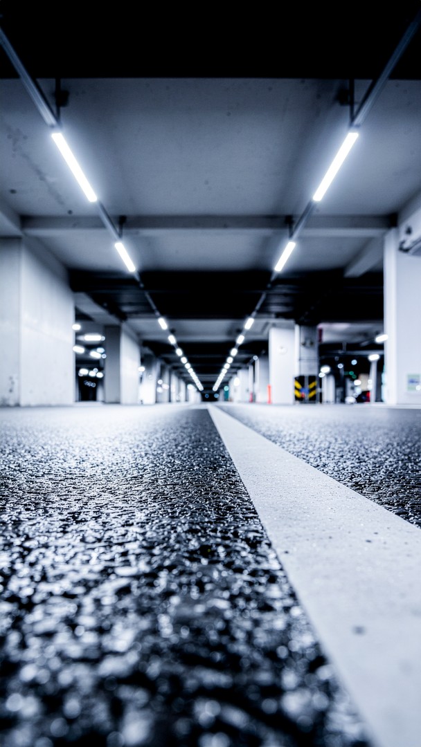 Empty Underground Parking Wallpaper - Urban Garage Depth & Lights 4K
