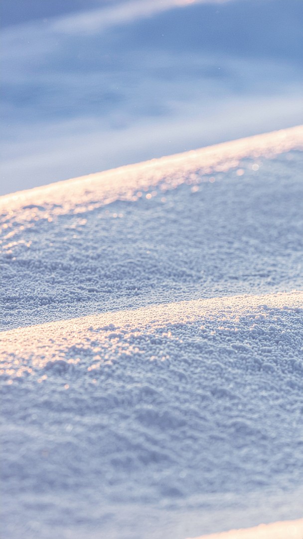 Macro Snow Texture Wallpaper - Golden Sunlight on Ice Crystals 4K