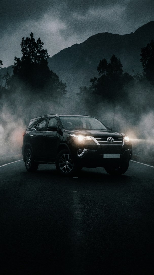 Black Fortuner HD Wallpaper 4K - SUV in Foggy Mountain Road