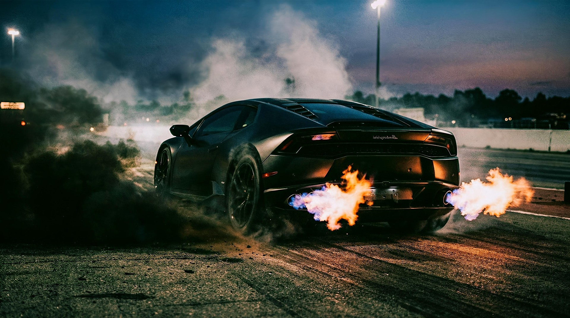 Black Lamborghini Burnout Fire Exhaust Night 4K Wallpaper
